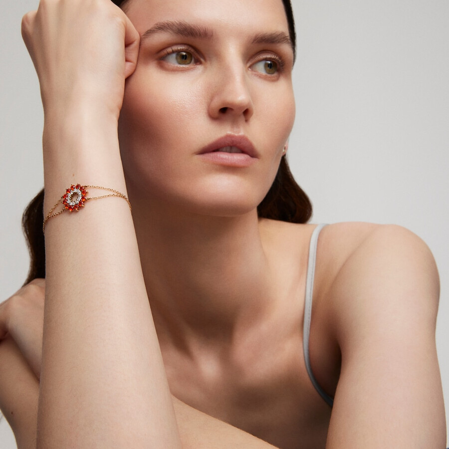 armband aus gold mit diamanten und opalen in flammenform tous atelier