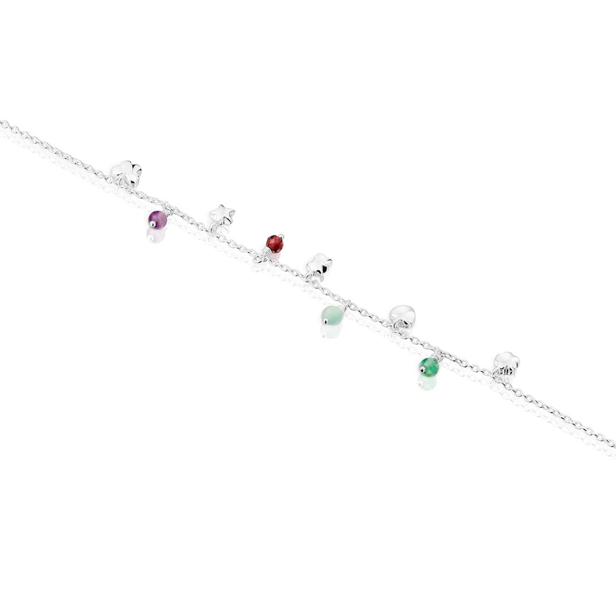 silbernes armband mit auffälligem motiv verziert mit edelsteinen und verzierungen
