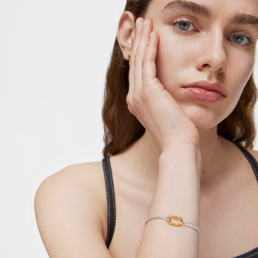 silbernes armband mit zweifarbigem ring oval