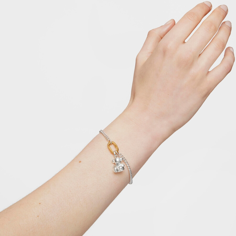 silbernes armband mit zweifarbigem ring oval