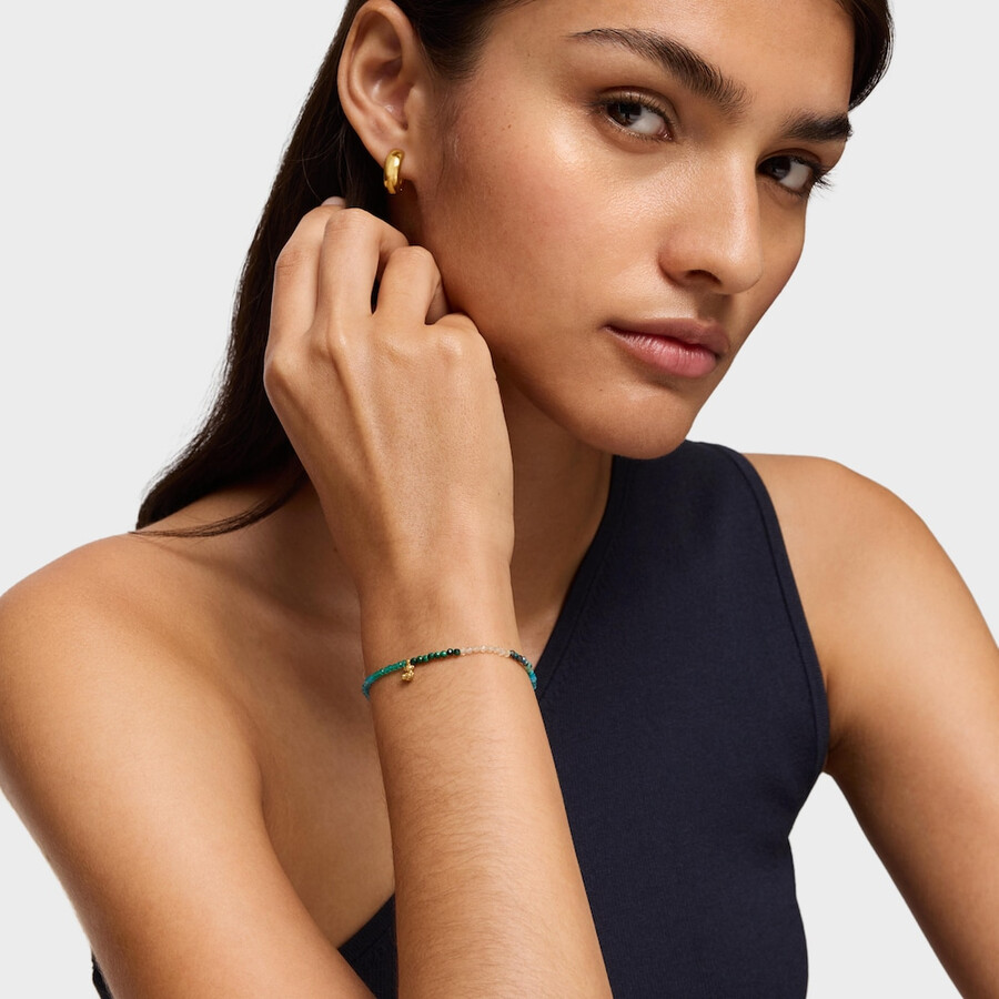 armband aus 18-karätig vergoldetem elastischem silber mit grünen edelsteinen tous bold bear