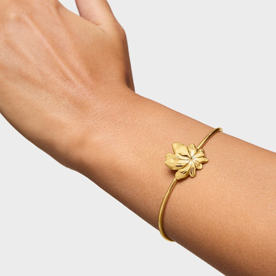 armreif aus 18-karätigem gold über silber mit yagrumo-motiv
