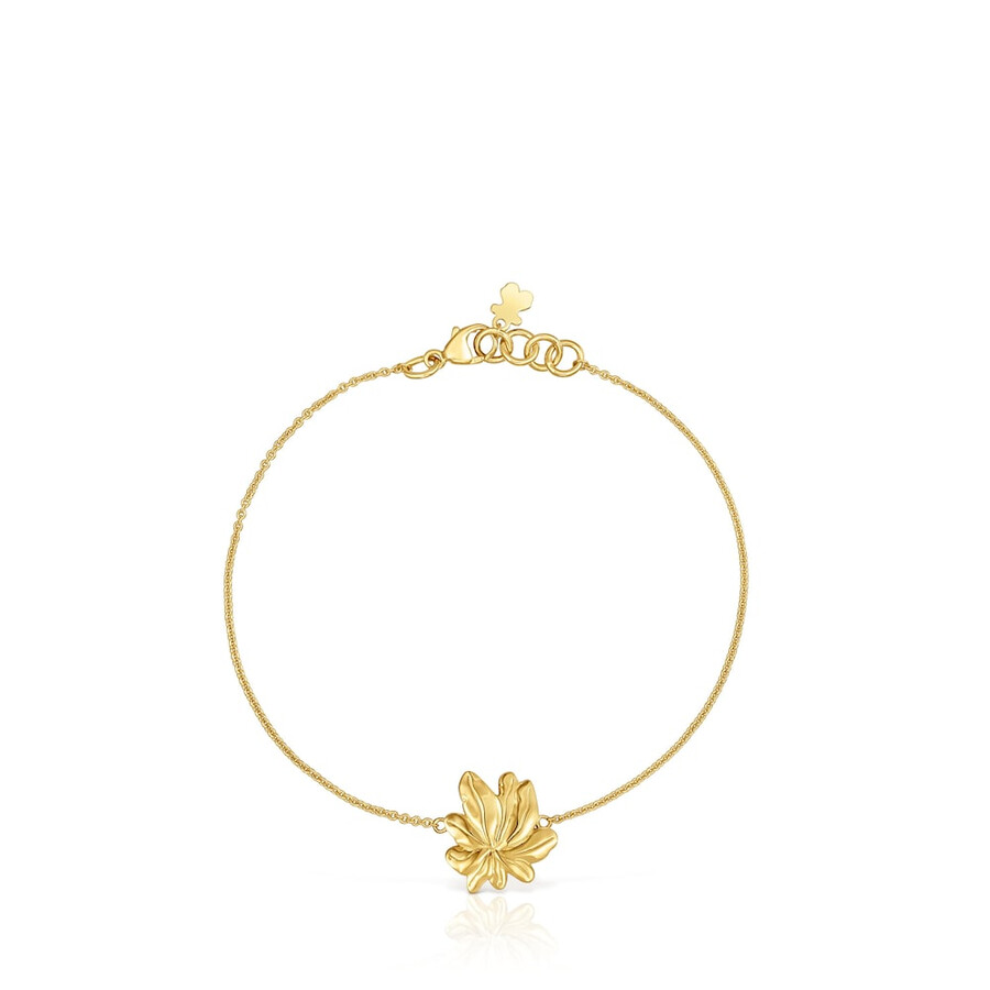 armband aus 18-karätigem gold über einer silberkette mit yagrumo-motiv