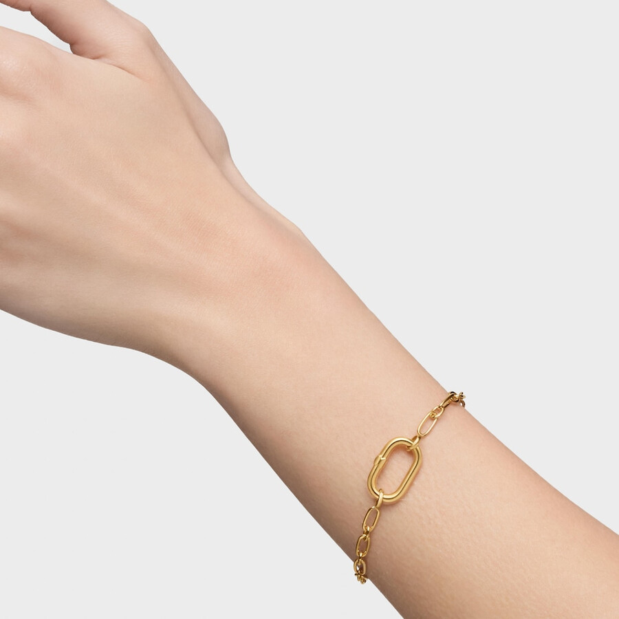 armband aus 18-karätig vergoldeter silberkette mit ringhalterung oval