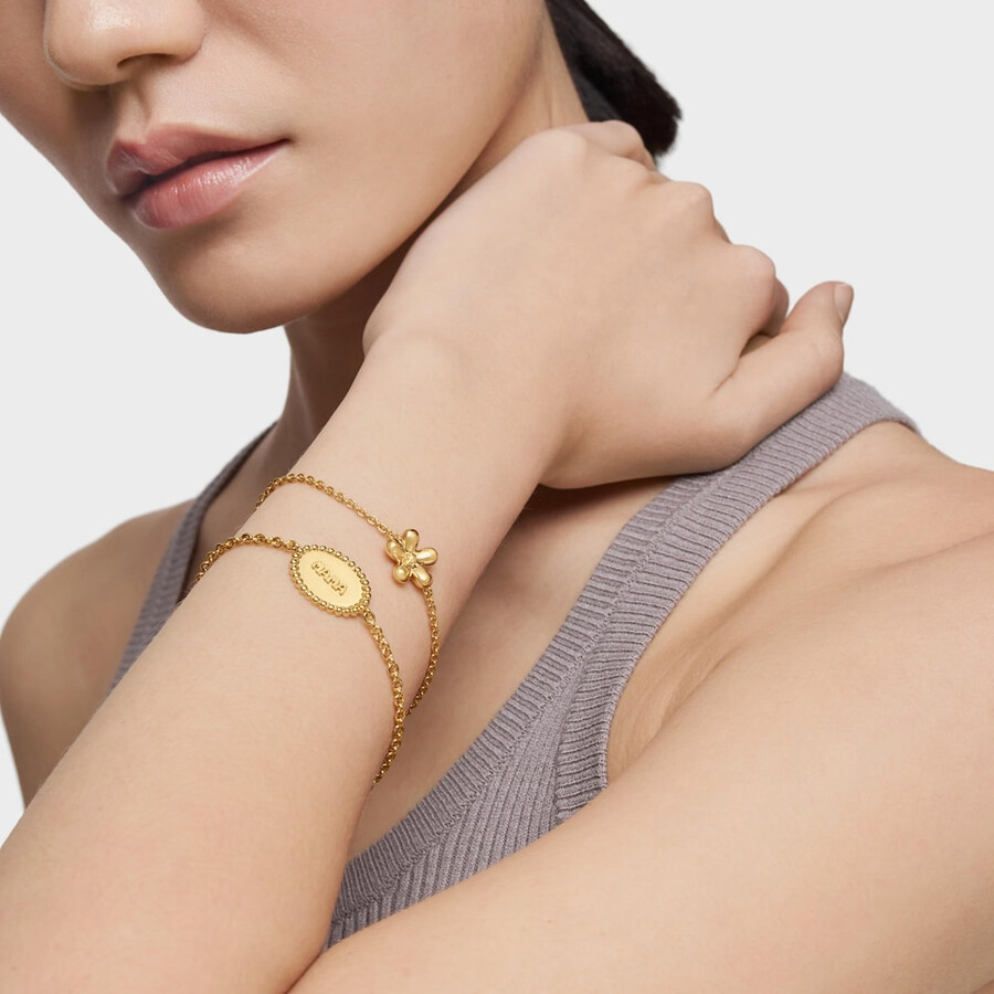 armband aus 18-karätigem gold über silberkette mit plakette tous mama