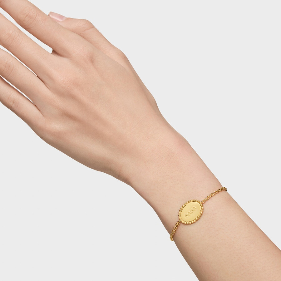 armband aus 18-karätigem gold über silberkette mit plakette tous mama