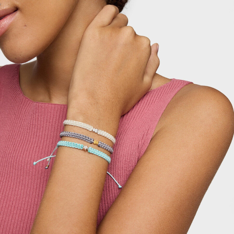bärenarmband mit 18-karätiger vergoldung auf silbernem und grauem nylon tous-motive