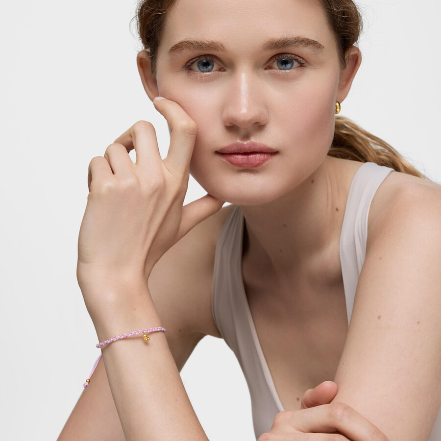 bärenarmband mit 18-karätiger vergoldung über silber und rosaweißem nylon tous-motive