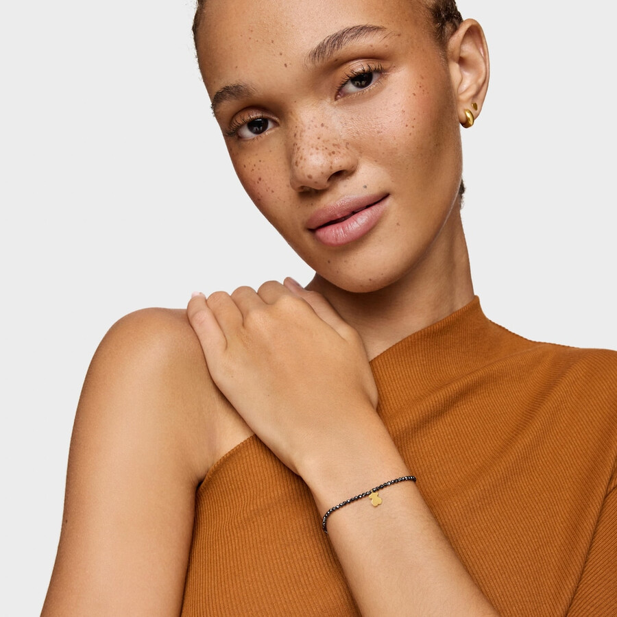 elastisches armband mit hämatit und bär 18 karat vergoldet auf silber tous motive