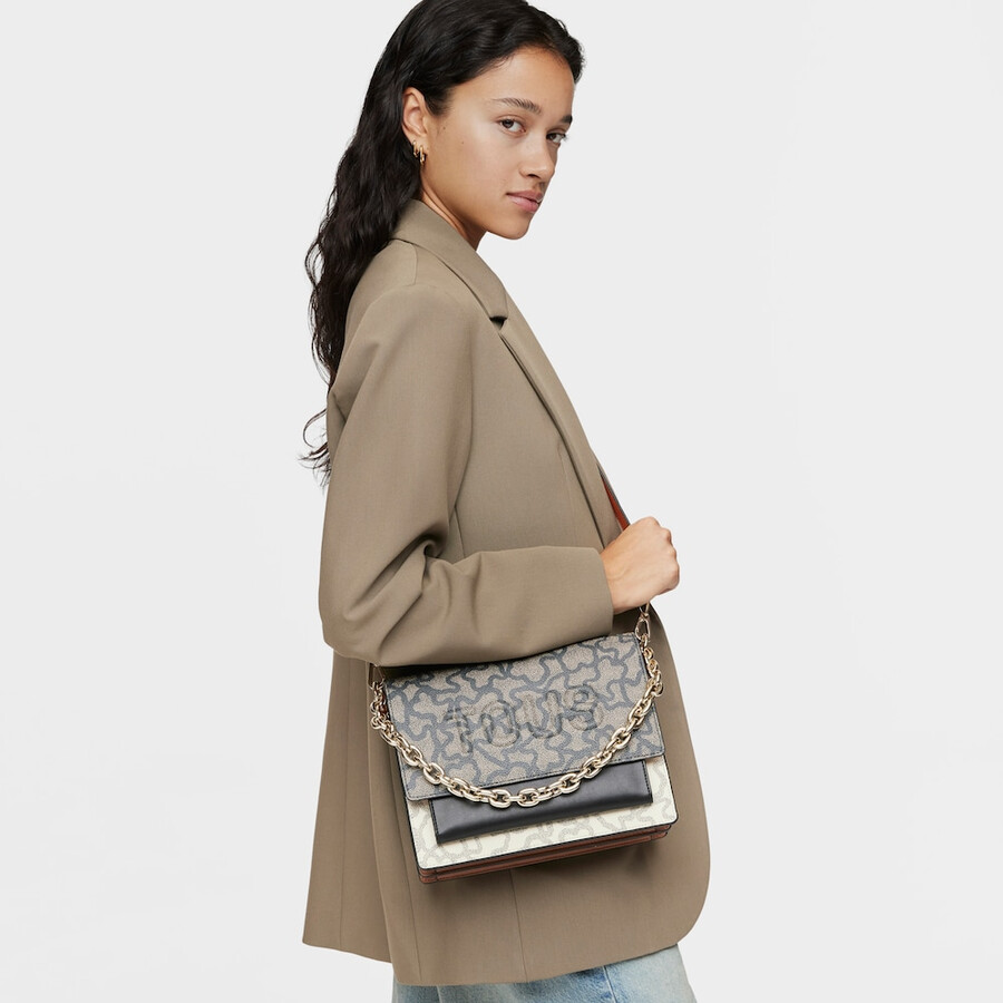 mittelgroße schwarze und beige audree chain crossbody-tasche kaos icon