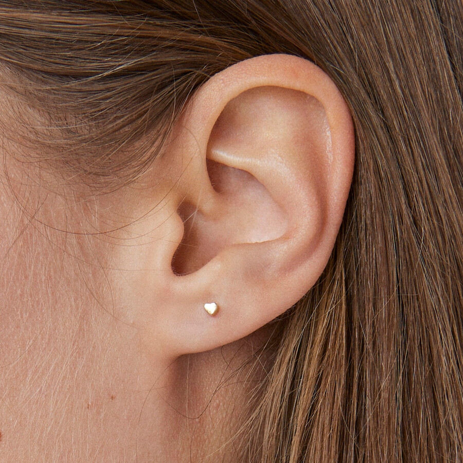 goldenes tous piercing ohrpiercing mit herz