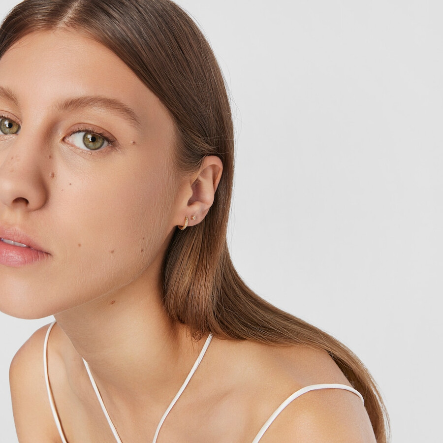tous piercing ohrpiercing mit diamant