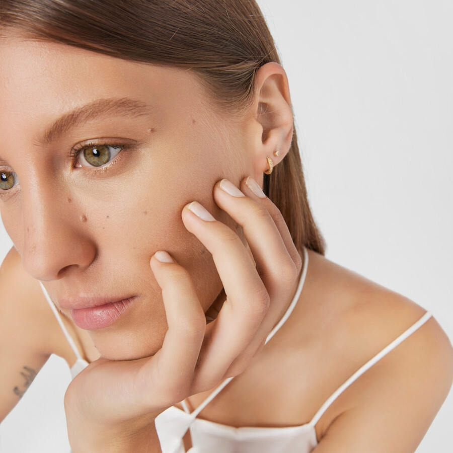 tous piercing ohrpiercing mit diamant