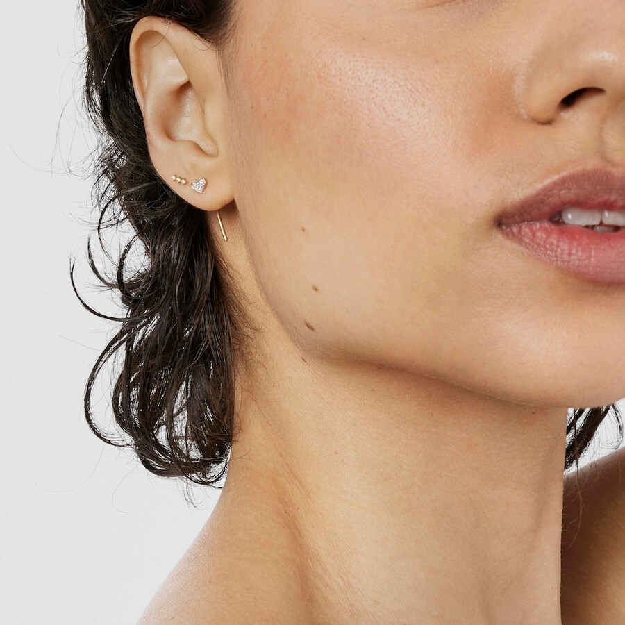 ohrpiercing mit goldstreifen und diamanten von les classiques