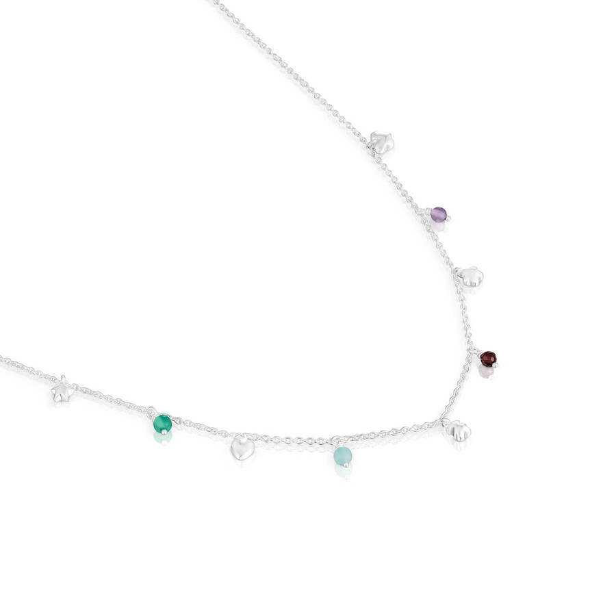 silberne halskette mit auffälligem motiv verziert mit edelsteinen und verzierungen