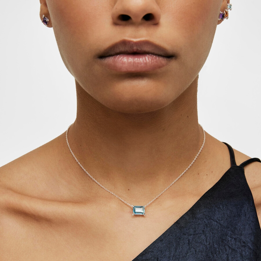 silberfarbene pillenkette mit topas