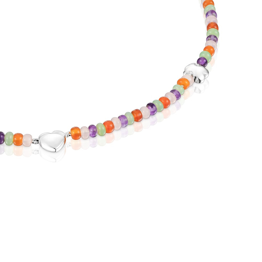 kurze edelsteinkette mit silbernen motiven auffälliges motiv