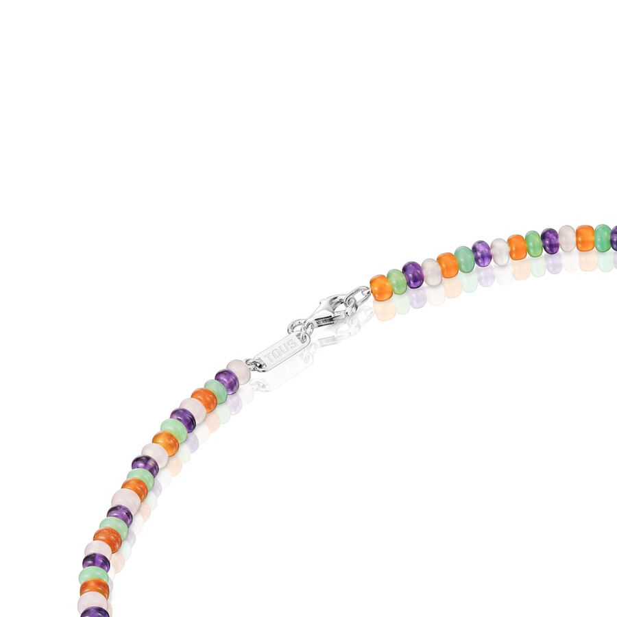 kurze edelsteinkette mit silbernen motiven auffälliges motiv
