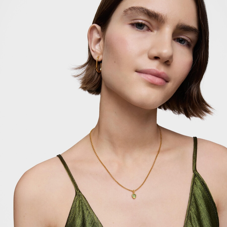 kleiner anhänger aus 18-karätigem gold auf silber mit peridot-medaillons