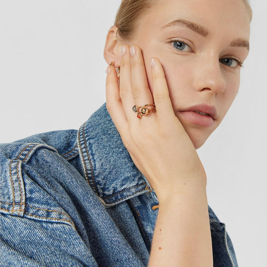 set aus drei silbervergoldeten plump-ringen mit edelsteinen