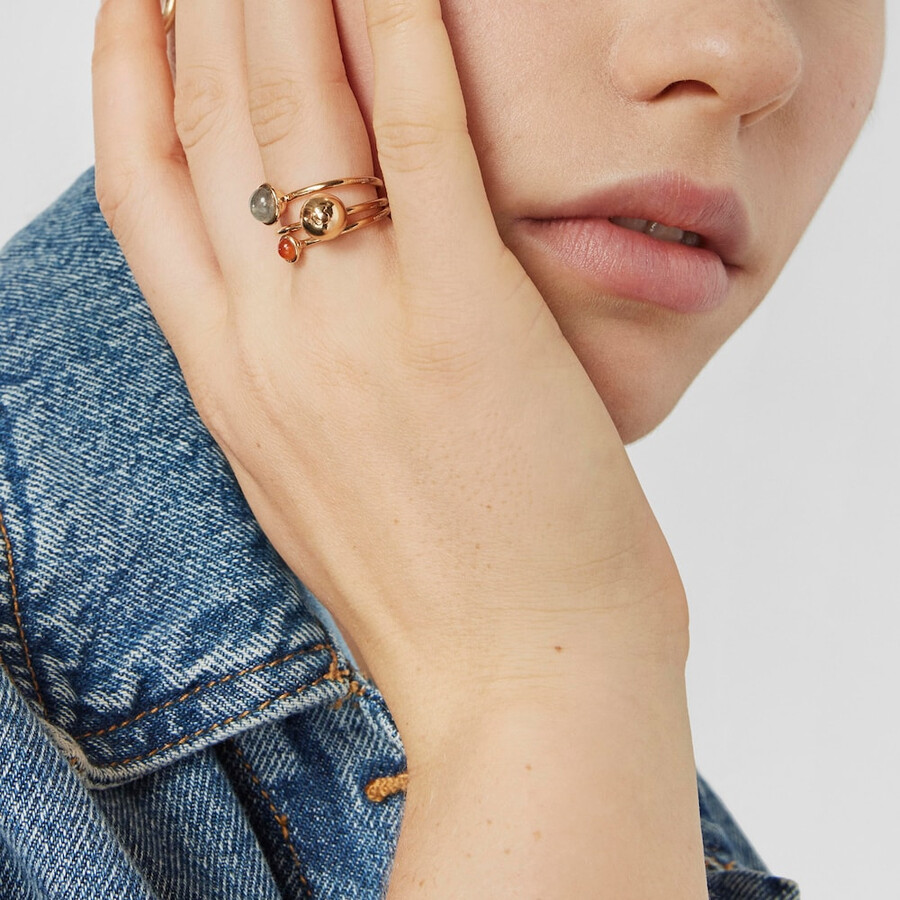 set aus drei silbervergoldeten plump-ringen mit edelsteinen