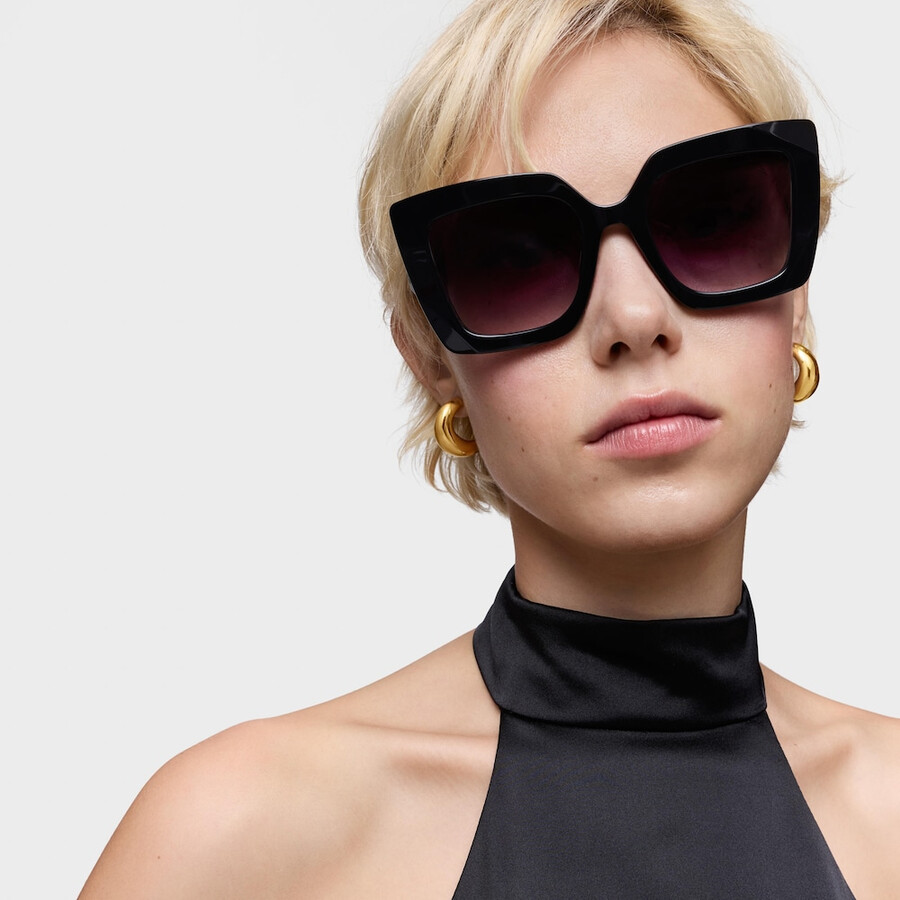 schwarze sonnenbrille mit tous-logo