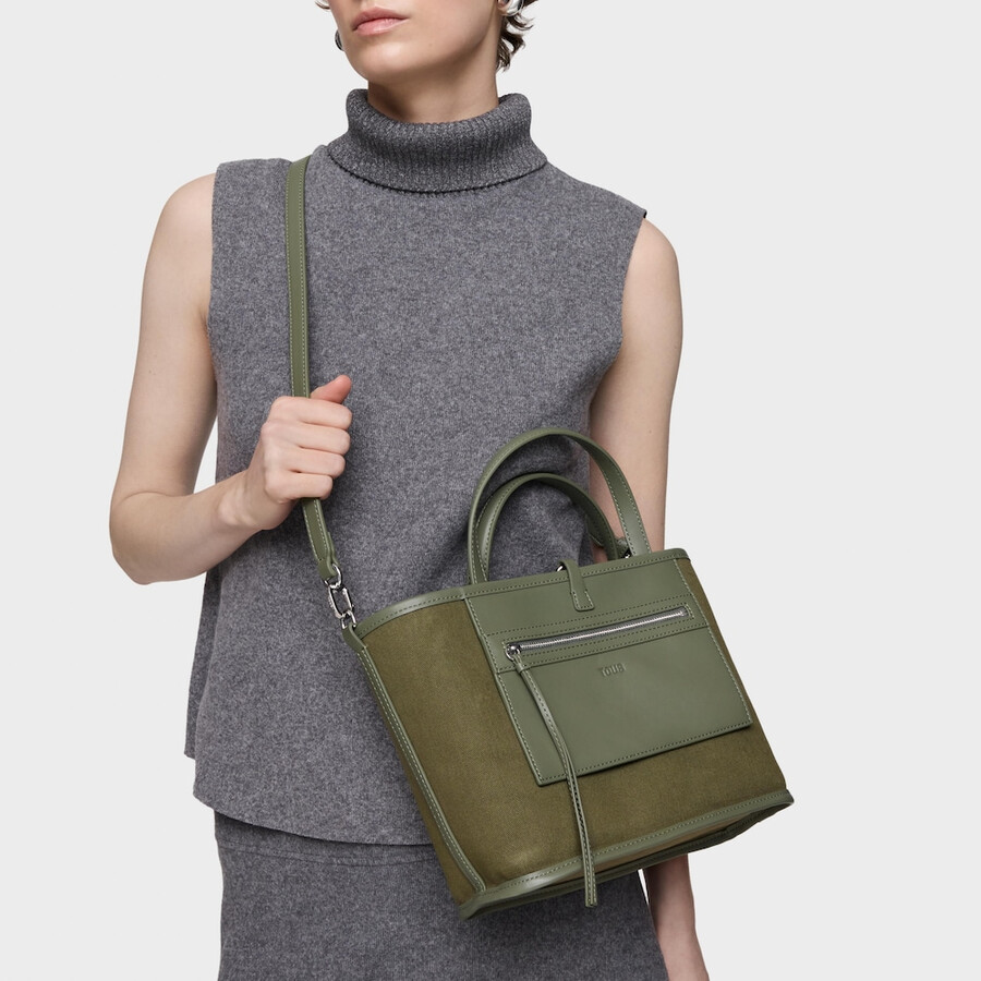 mittelgroße khakifarbene wendetasche tous double way manifesto