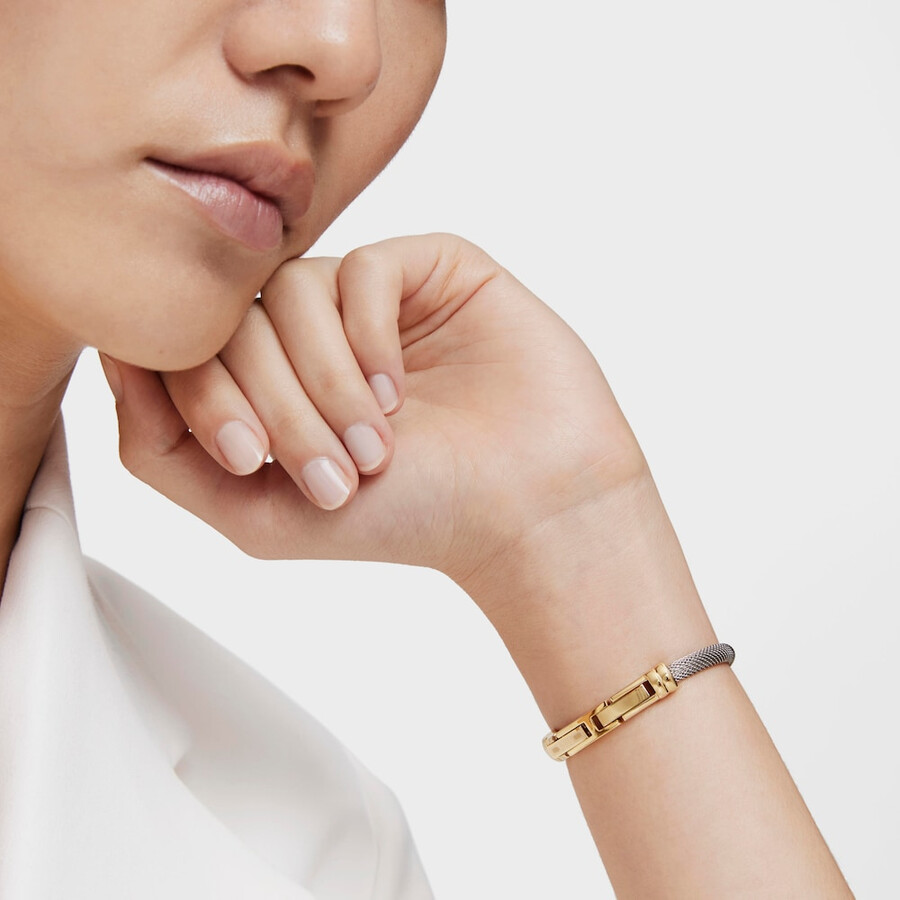 analoge armbanduhr mit stahlarmband und goldfarbenem ipg-gehäuse tous hold oval