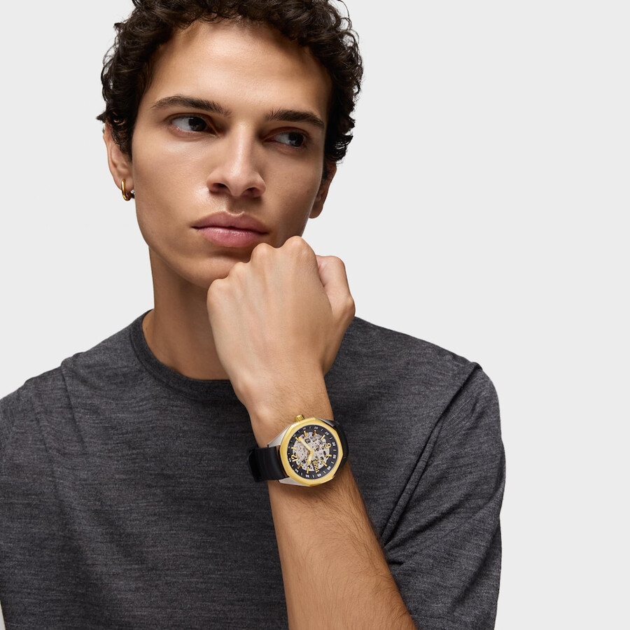 automatische analoge armbanduhr mit goldfarbenem ip-stahlgehäuse und schwarzem silikonarmband von tous now