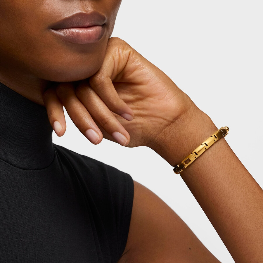 analoge uhr mit goldfarbenem ipg-stahlarmband und onyxfarbenem tous color-armband