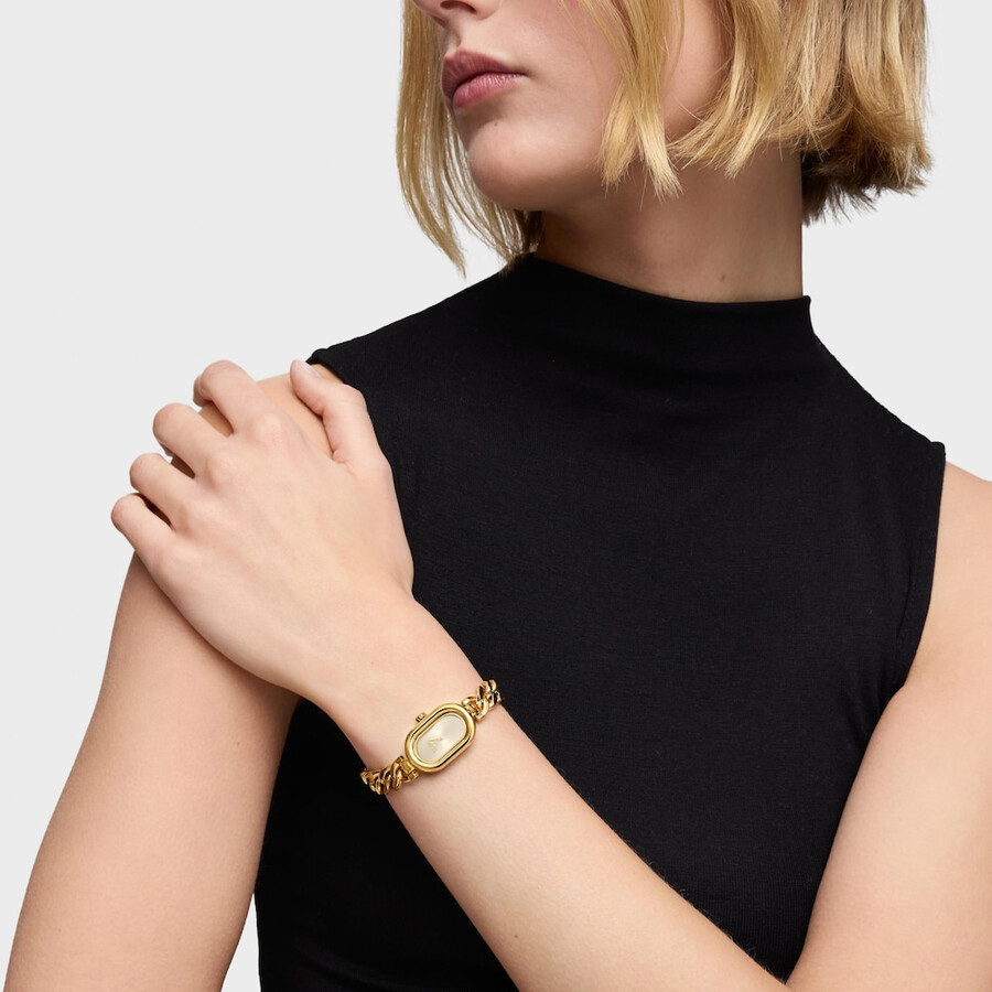 analoge armbanduhr mit schmucksteinen und goldfarbenem stahlarmband ovale zeitzone