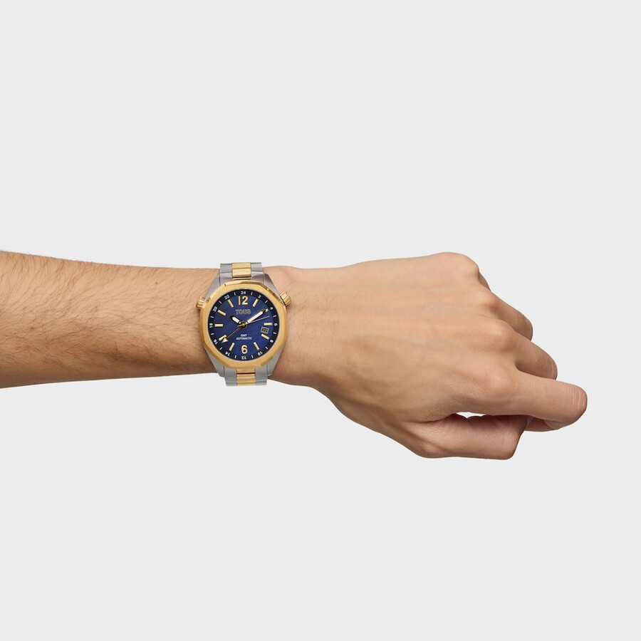 automatische gmt-uhr mit blauem perlmuttzifferblatt und zweifarbigem stahlarmband. tous now