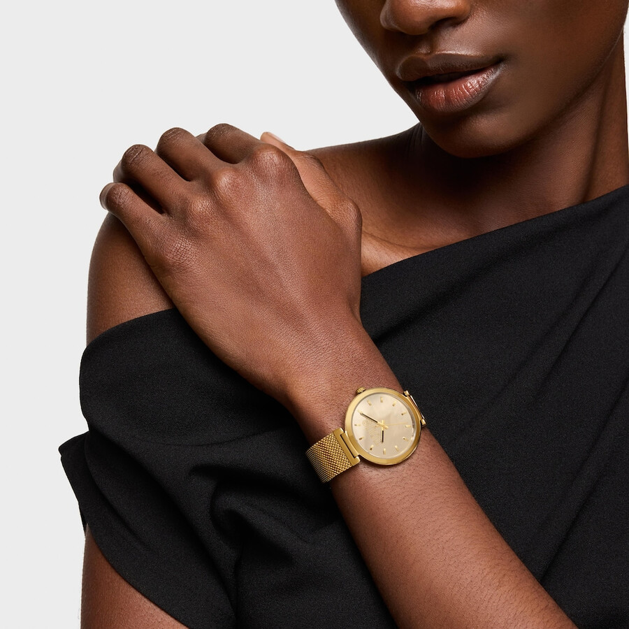 analoge uhr mit goldfarbenem zifferblatt und armband aus s-mesh-gewebe