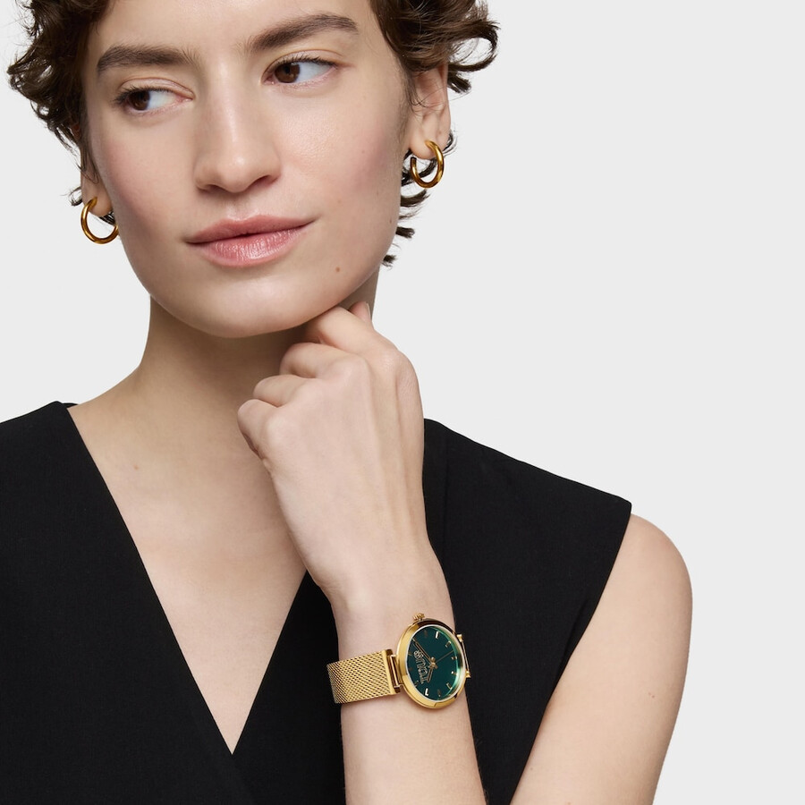 analoge uhr mit grünem zifferblatt und goldfarbenem armband s-mesh-spiegel
