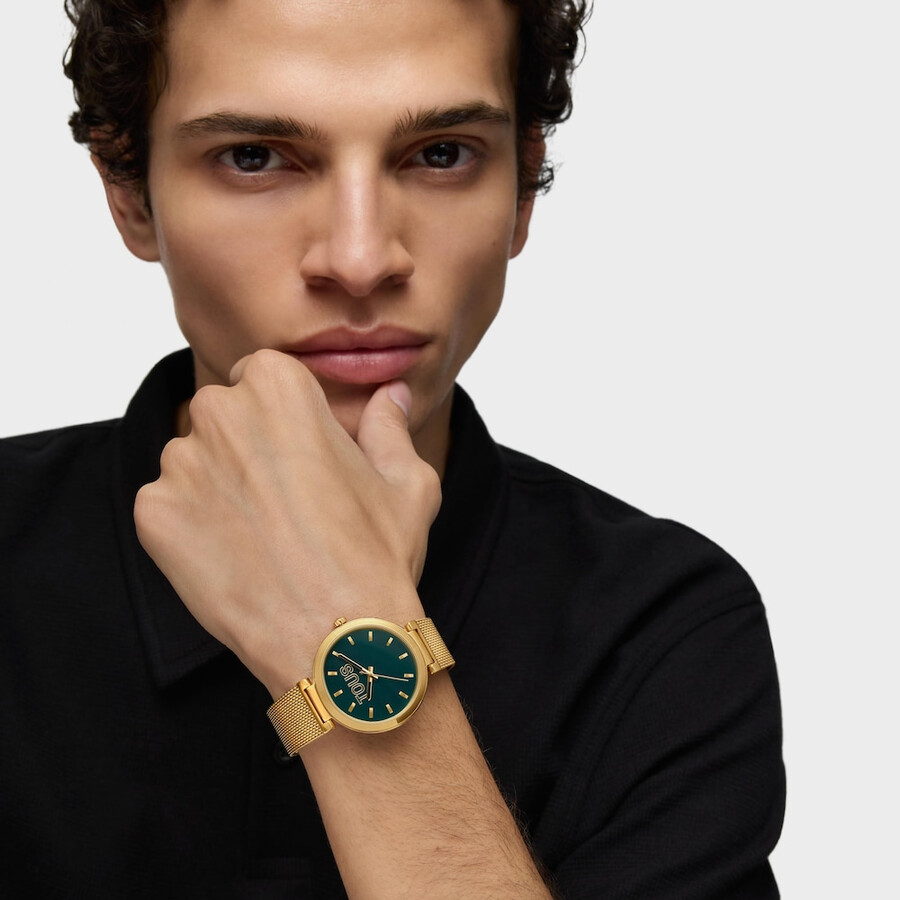 analoge uhr mit grünem zifferblatt und goldfarbenem armband s-mesh-spiegel