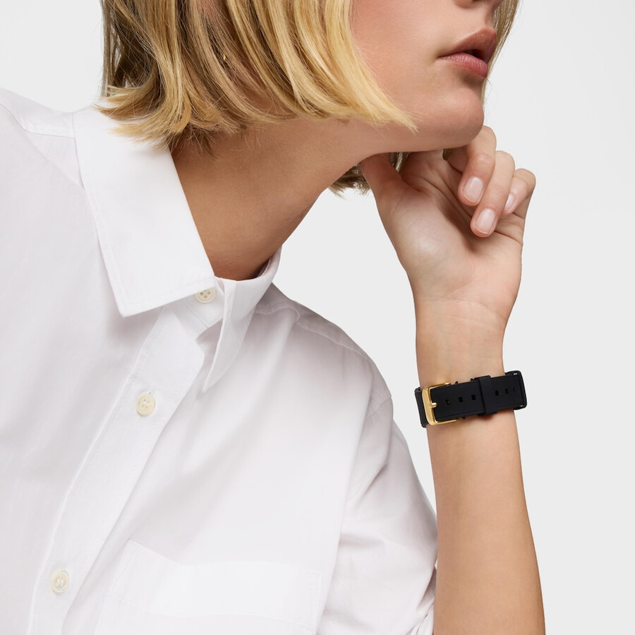 goldfarbene analogedigitale armbanduhr aus stahl und schwarzes nylonarmband