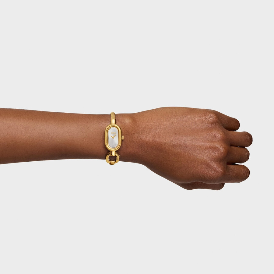 analog-digitaluhr mit goldfarbenem stahlarmband tous hold oval
