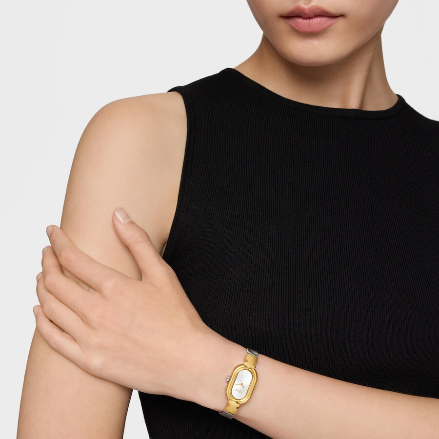 schmuckbesetzte analoge armbanduhr mit armband aus edelstahl und goldfarbenem edelstahl ovales symbol