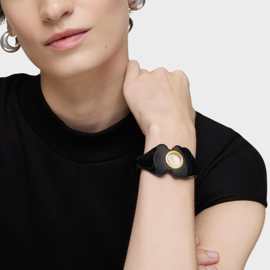 analoge armbanduhr aus goldfarbenem stahl mit rauchbraunem polycarbonat-gehäuse modell t. l bear folks